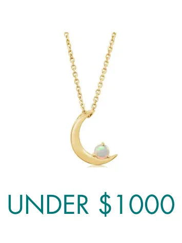 Close-up of a silver necklace with a diamond pendant. Click to shop all necklaces at Ware's Jewelers.