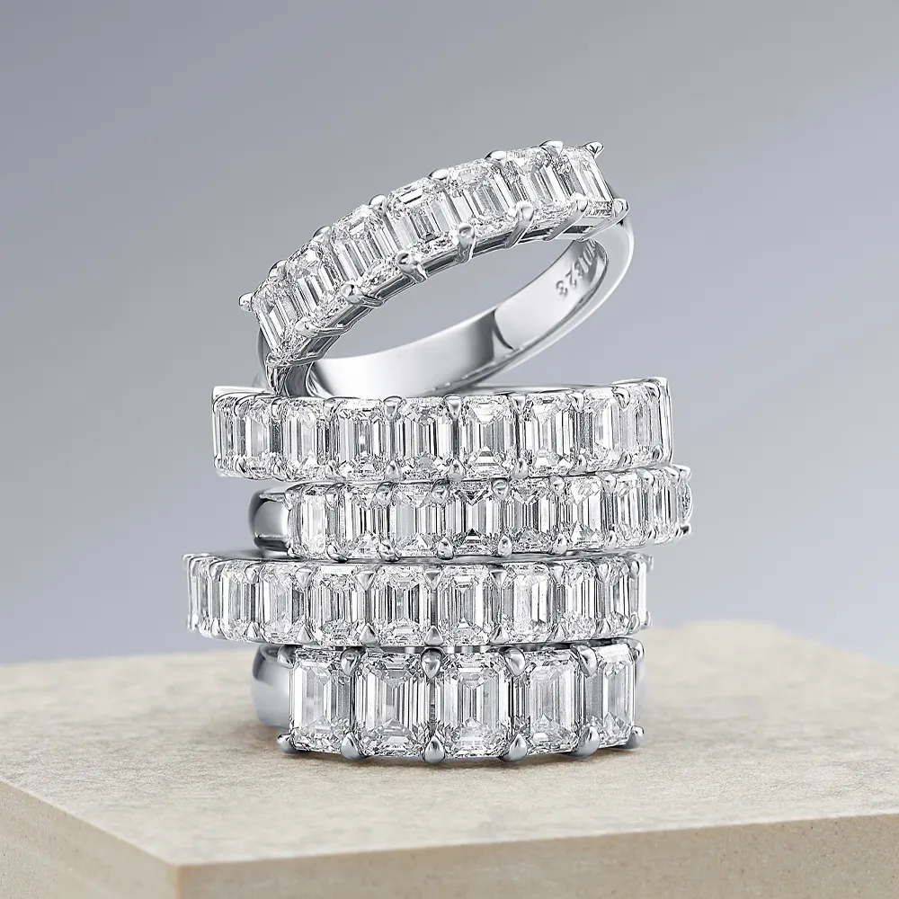 Elegant stack of diamond wedding bands on display.