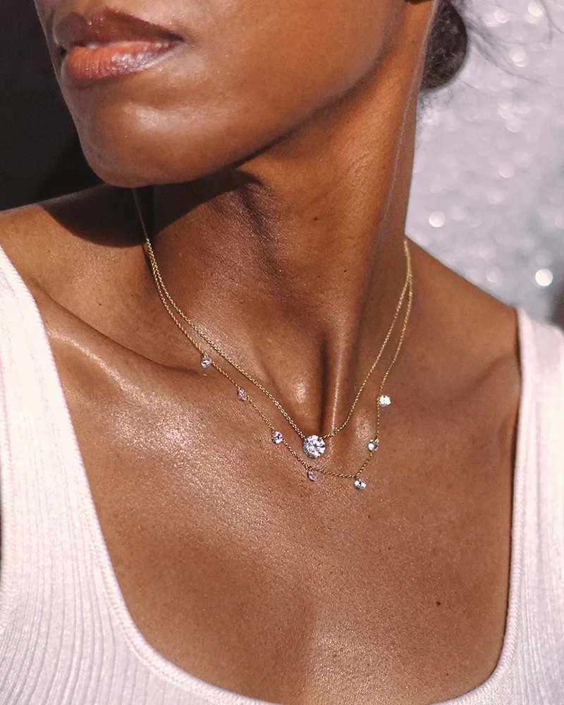 Model wearing a Lafonn simulated-diamond station necklace