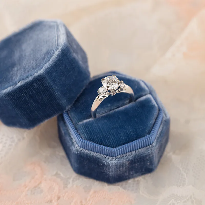 Diamond engagement ring in blue velvet box from LeeBrant Jewelry & Watch Co.