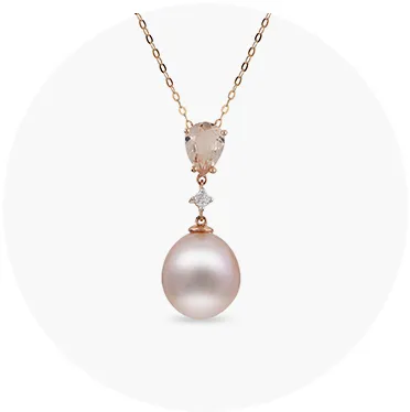 Elegant pearl and gemstone necklace on a delicate chain. Click to explore more necklaces at Mesa Jewelers.